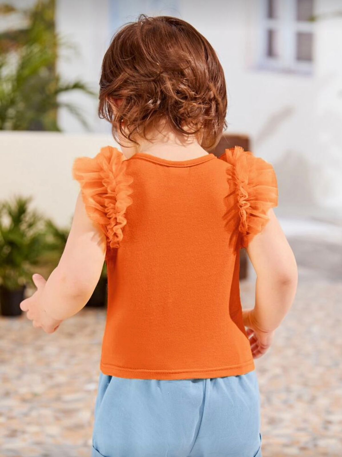 Ruffles girl orange shirt