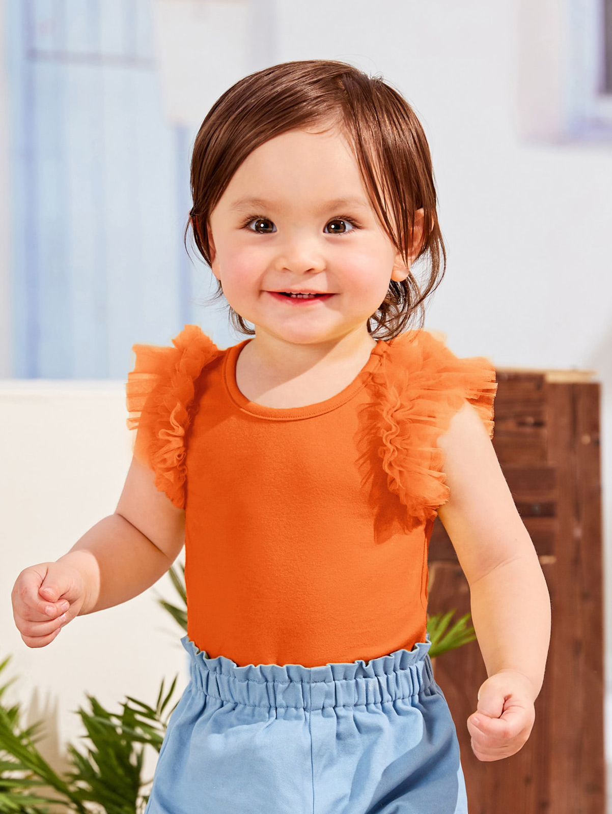 Ruffles girl orange shirt